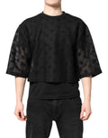 Top noir en mesh Dolce & Gabbana à manches courtes avec motif discret et ourlet court transparent