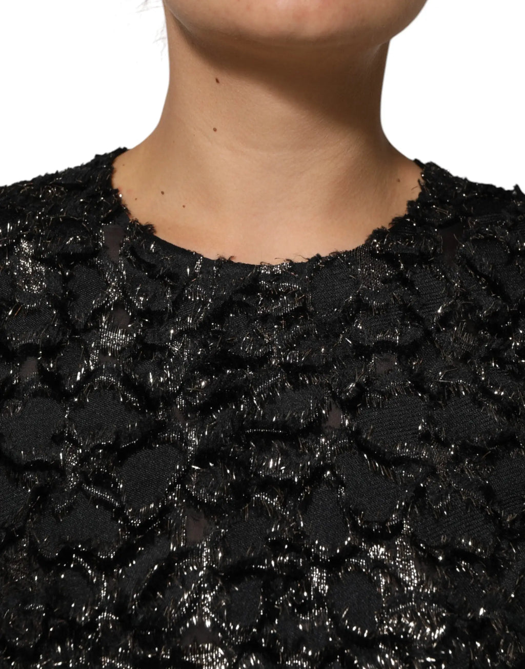 Top en dentelle noire avec motif floral texturé et détails scintillants léger pour robe Dolce & Gabbana noire en tweed bouclé à sequins