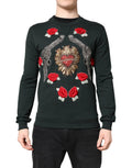 Dolce & gabbana pull noir avec broderies de roses rouges, pistolets argentés et cœur en sequins