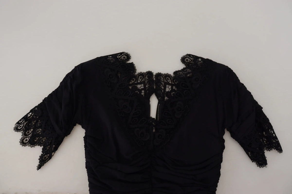 Blouse noire en soie dolce & gabbana avec dentelle, corsage froncé et broderie florale délicate