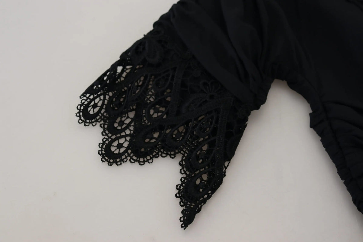 Manche en dentelle noire avec motifs complexes sur robe midi fourreau en soie dolce gabbana