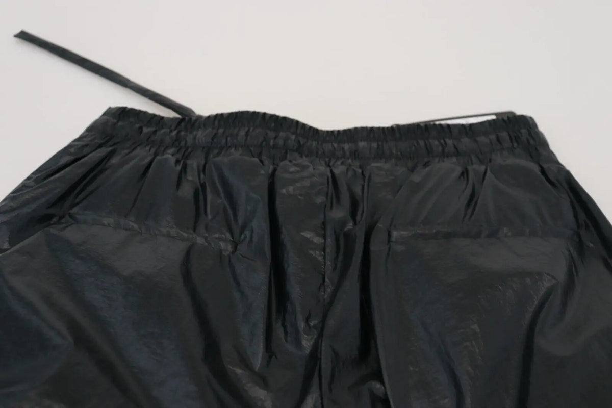Dolce & gabbana pantalon en nylon noir brillant avec taille élastique et cordon de serrage