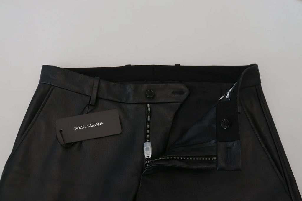 Pantalon skinny noir dolce & gabbana en tissu extensible brillant avec une coupe ajustée et un design élégant