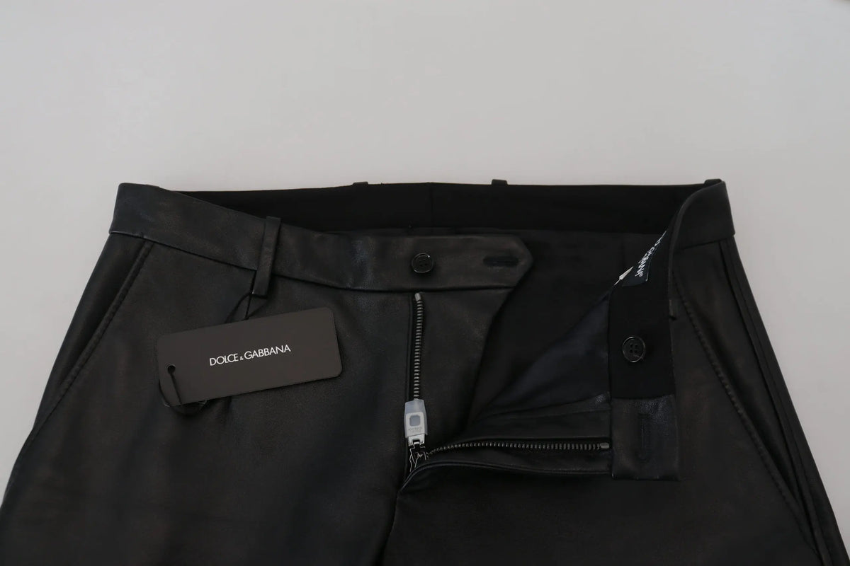 Pantalon skinny noir dolce & gabbana en tissu extensible brillant avec une coupe ajustée et un design élégant