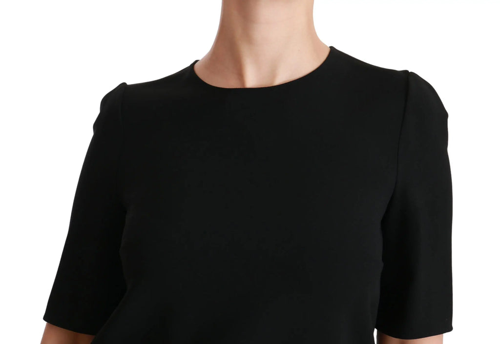 Dolce & gabbana blouse noire stretch à manches courtes avec épaules structurées pour un style casual