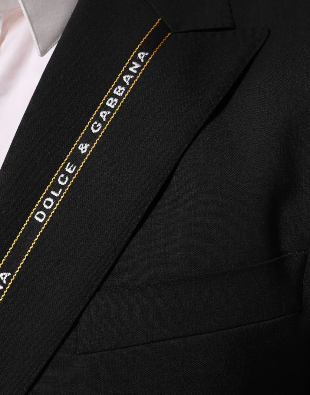 Veste dolce gabbana sicilia noire double boutonnage avec branding fils dorés le long de la couture