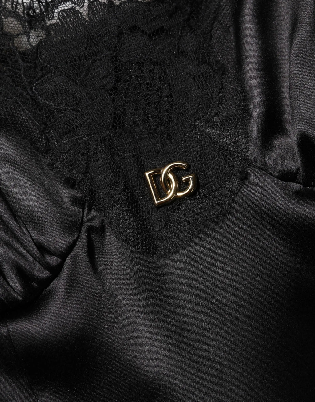 Broche logo dg doré sur tissu noir en dentelle et satin pour robe mini sans manches en mélange de soie Dolce & Gabbana