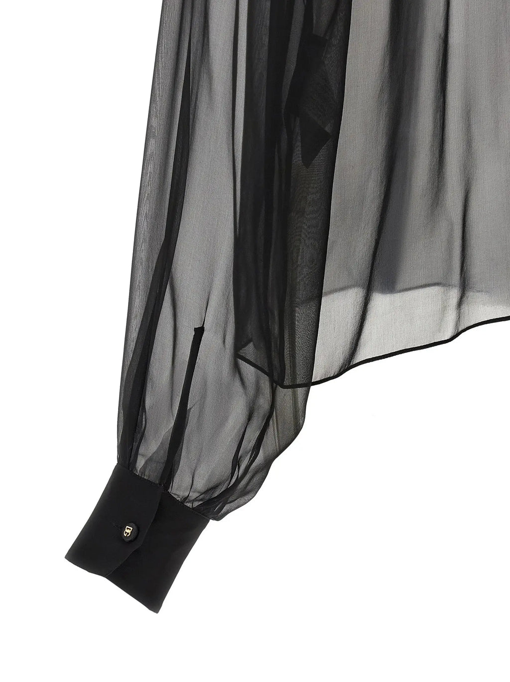 Manche de blouse noire en chiffon transparent avec poignet noir uni et bouton doré dolce gabbana en soie