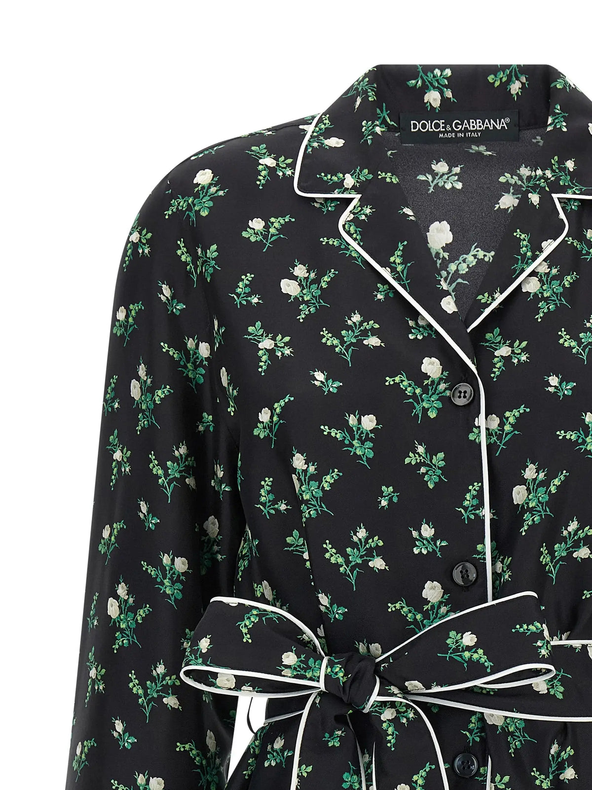 Blouse en soie noire dolce & gabbana avec motif floral blanc et feuilles vertes et bordure blanche contrastante
