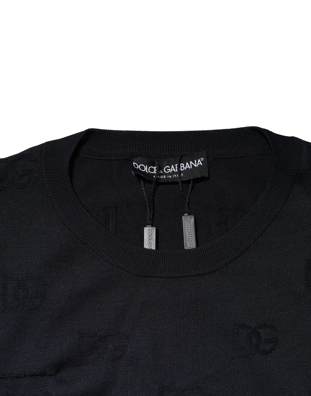 Dolce & gabbana pull en soie noir à col rond avec logo brodé subtil sur le devant