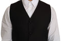 Dolce & gabbana noir en soie gilet de robe avec une coupe ajustée élégante et trois boutons assortis sur le devant