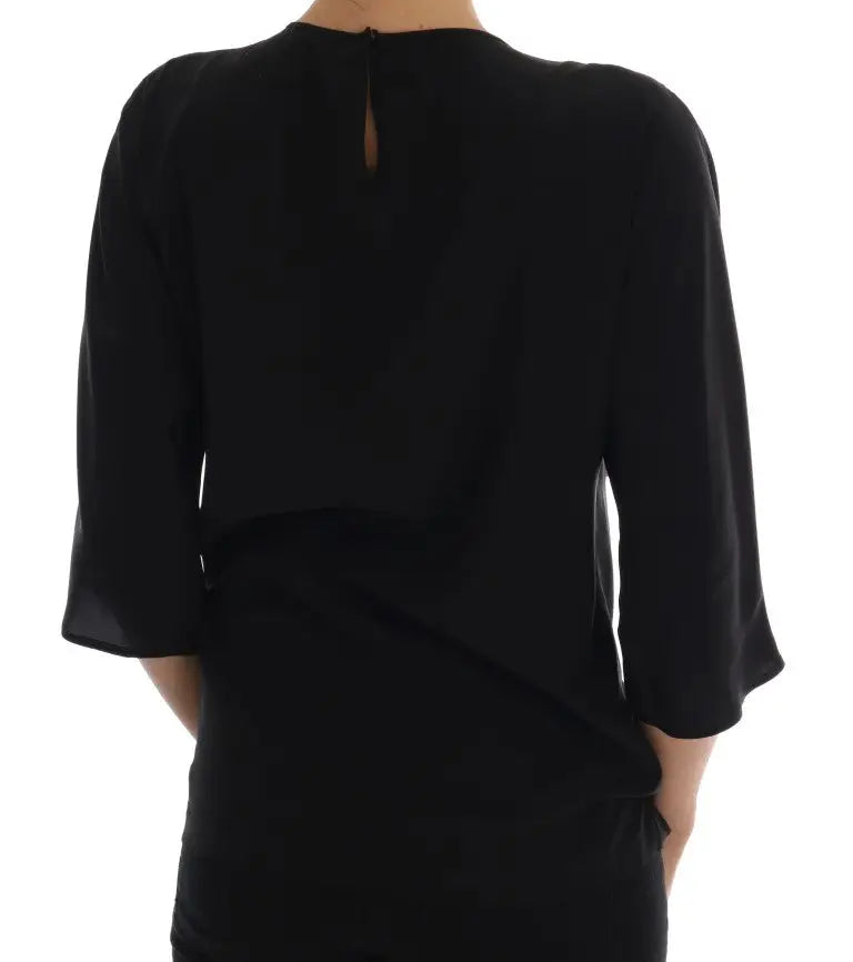 Blouse noire dolce & gabbana en soie avec manches trois quarts et fente subtile au dos vue arrière