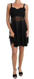 Robe Dolce & Gabbana noire en soie avec dentelle, panneau en mesh transparent et ourlet volanté