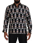 Chemise homme noire en soie dolce gabbana à manches longues avec motif répétitif de bouteilles de bière blanches racco di venere et accents rouge bleu or