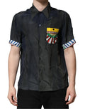 Dolce & gabbana chemise noire en soie homme manches courtes avec patch brodé coloré et poignets rayés