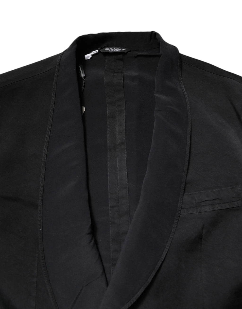 Veste noire dolce gabbana en satin avec revers en satin et coupe ajustée pour costume élégant