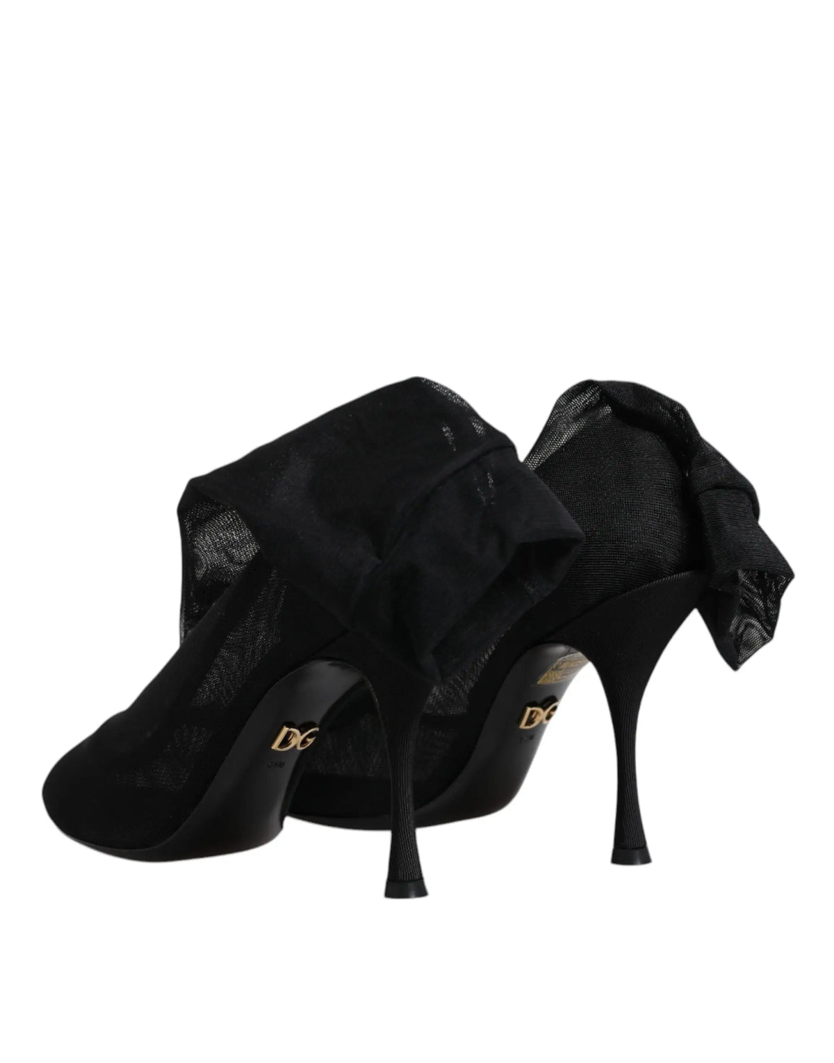 Bottes chaussettes dolce & gabbana en maille stretch en soie noire avec talons hauts et nœud décoratif en mesh transparent
