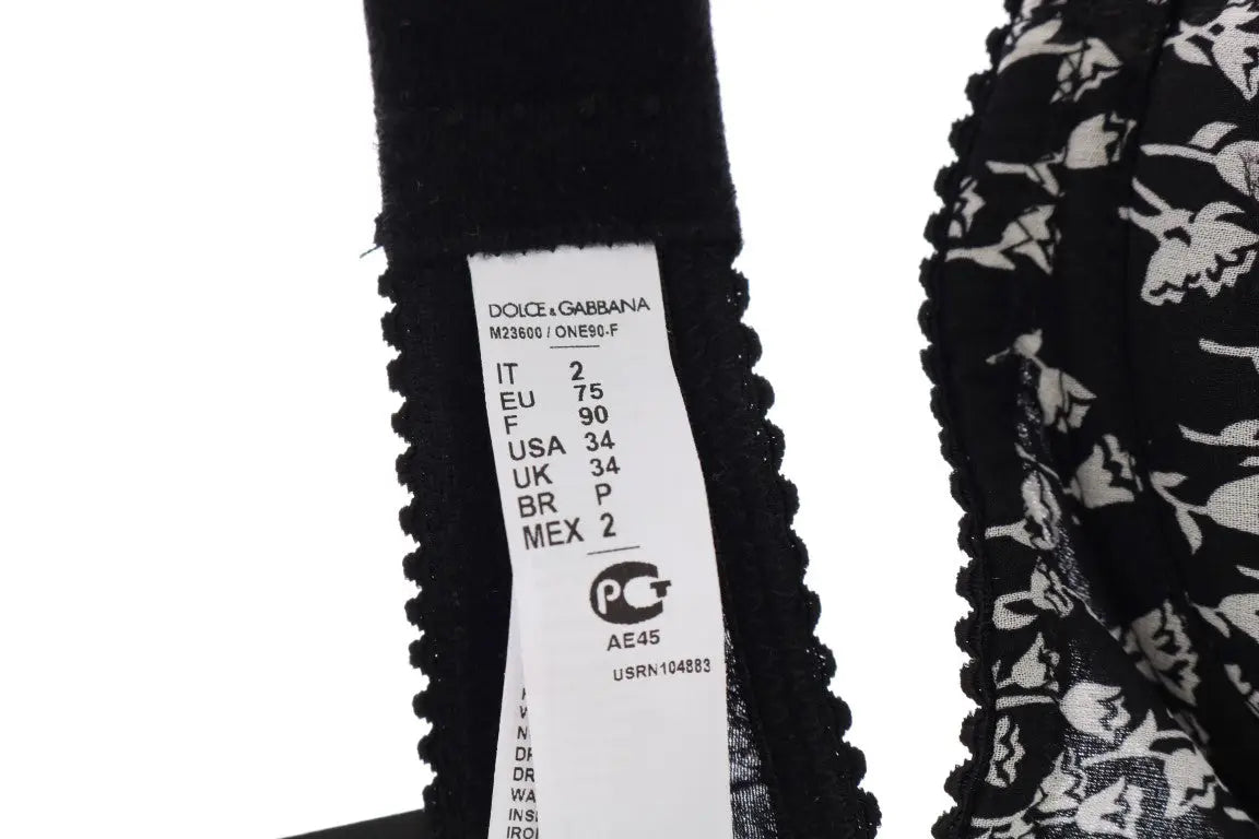 Étiquette noire à dentelle blanche sur un soutien-gorge en soie noire Dolce & Gabbana indiquant la taille