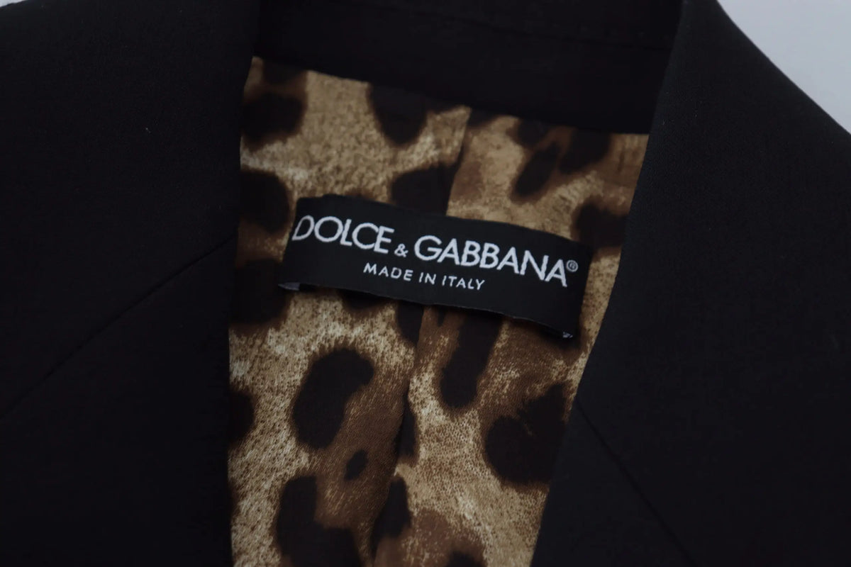 Étiquette noire dolce & gabbana avec texte blanc sur tissu léopard sur veste blazer ajustée simple boutonnage en laine