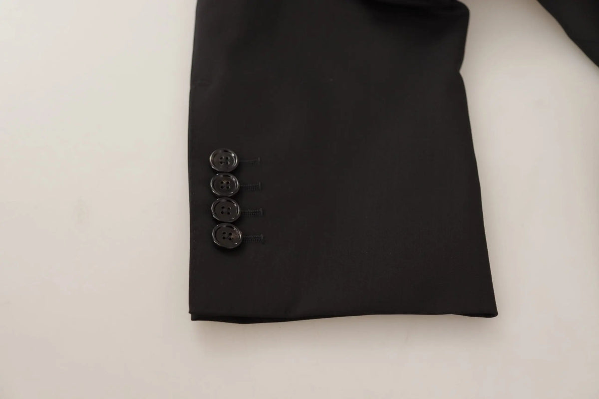 Manche de veste noire dolce & gabbana martini avec quatre boutons assortis noirs