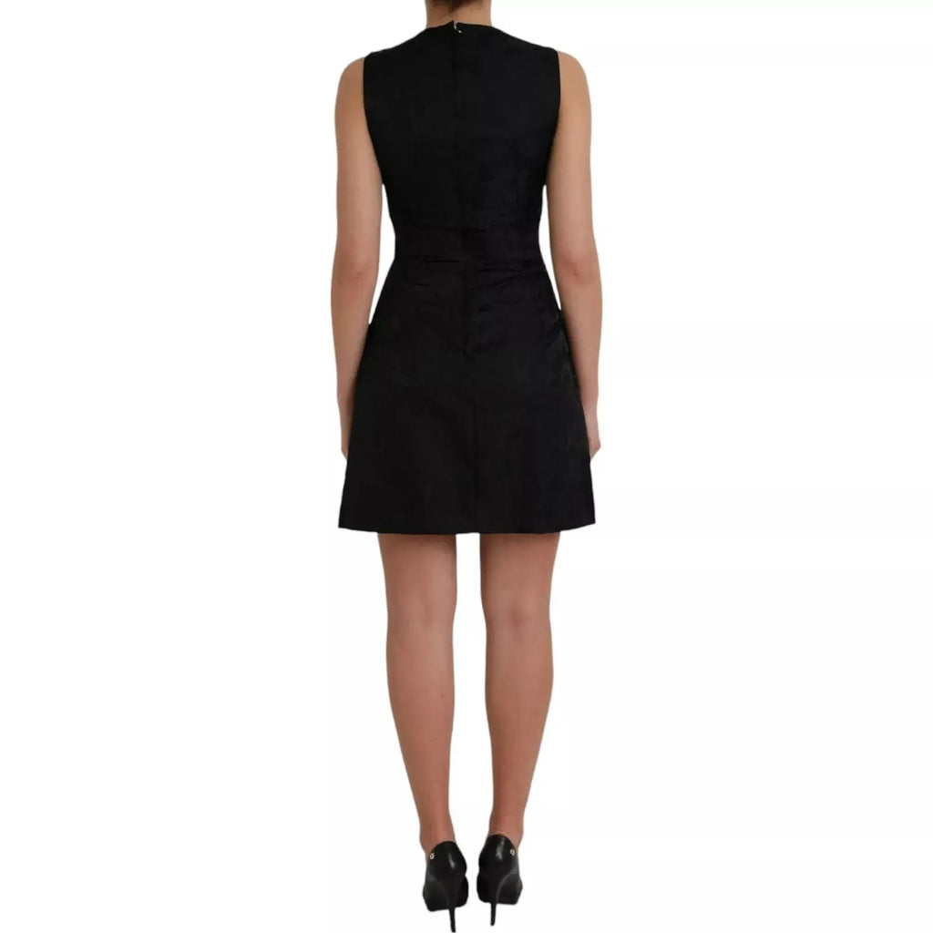 Robe noire sans manches Dolce & Gabbana ajustée avec jupe évasée et fermeture éclair au dos vue arrière