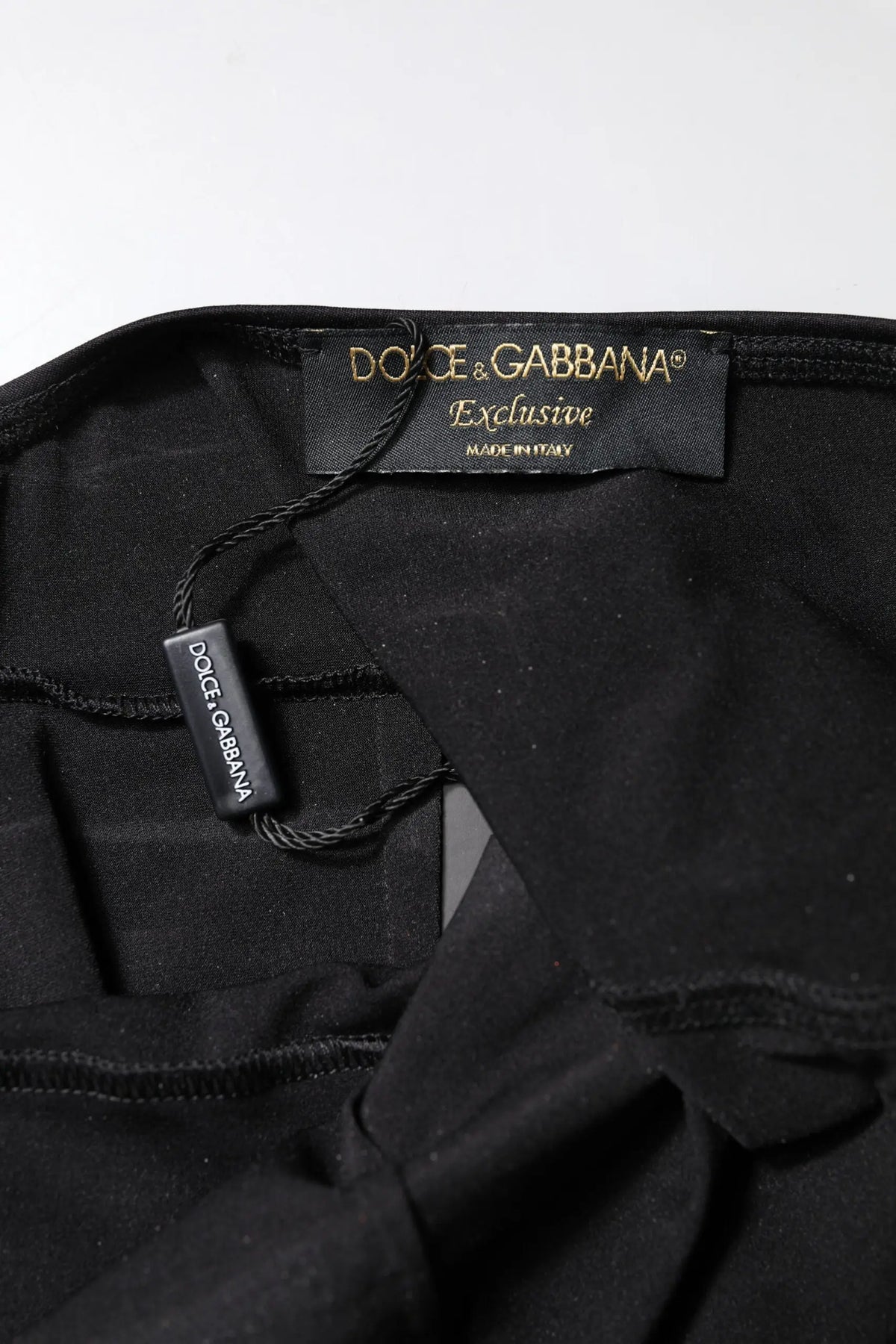 Pantalon exclusif dolce & gabbana noir en tissu satiné avec légère brillance et coutures élégantes pour femme