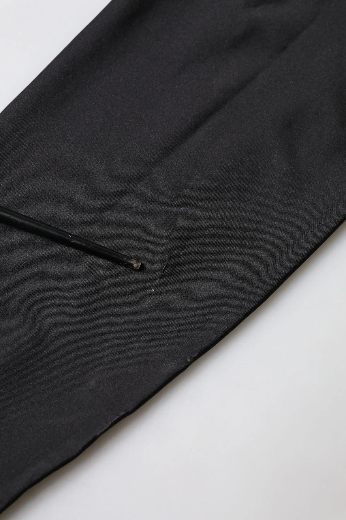 Pantalon noir en tissu dolce & gabbana avec petit déchirure près de l’ourlet pour combinaison femme bodycon sans manches