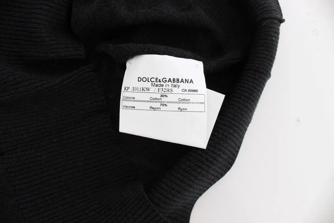 Étiquette noire en maille côtelée de dolce & gabbana avec texte blanc indiquant le nom de la marque et la composition du tissu