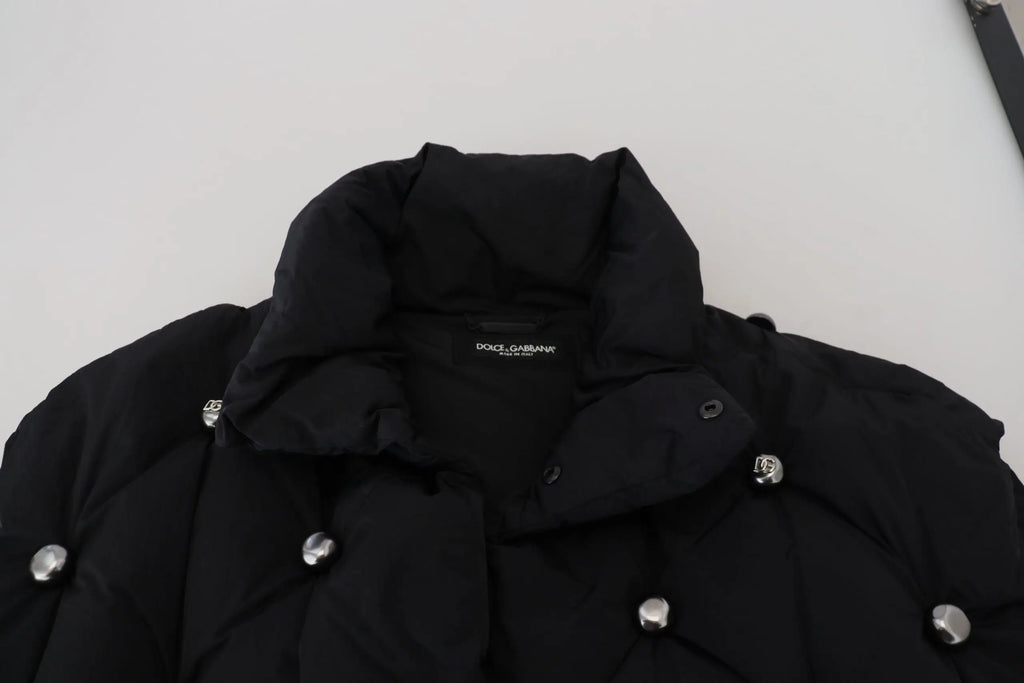 Dolce & gabbana veste sans manches noire matelassée avec boutons argentés et étiquette de marque au col