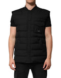 Dolce & gabbana veste parka sans manches noire matelassée avec col montant et fermeture à boutons devant