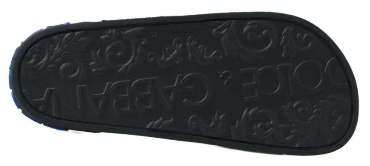 Semelle en caoutchouc noire de sandales slides dolce & gabbana avec logo embossé et motif floral orné