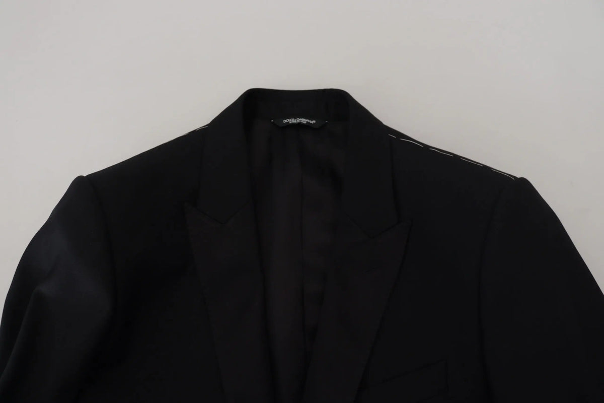 Dolce & Gabbana blazer noir slim fit en tissu formel avec couture blanche discrète sur lépaule