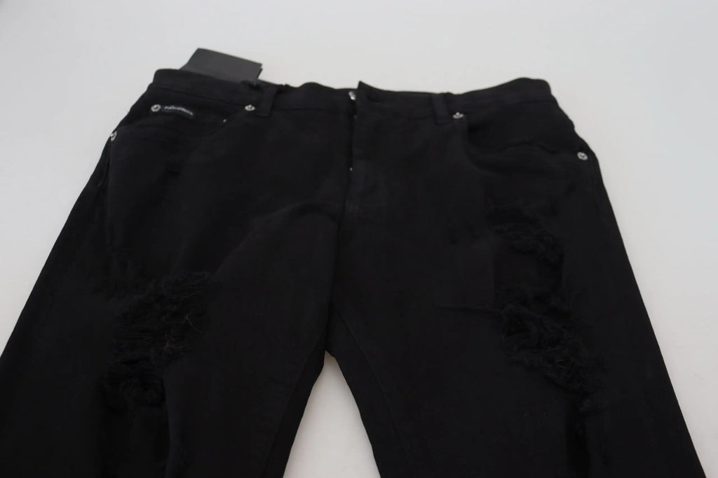 Dolce & gabbana jean slim fit noir en denim coton avec design déchiré brut et accessoires argentés