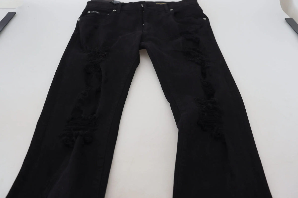 Dolce & Gabbana jean slim fit noir en coton déchiré avec genoux déchirés et accessoires argentés