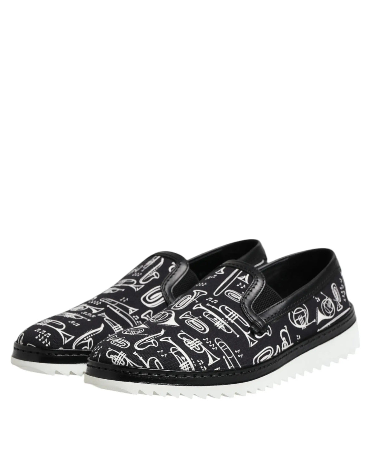 Dolce & gabbana slip-on noir pour homme avec motif instrument de musique blanc et semelle en caoutchouc texturée
