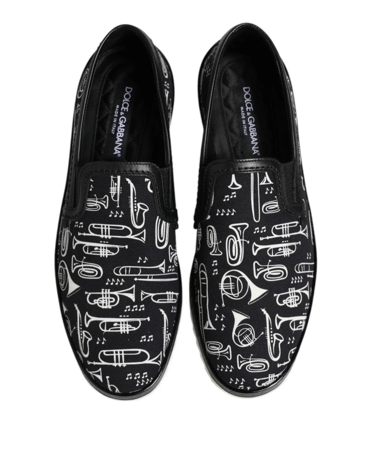 Dolce & gabbana noire slip-on pour homme avec motif blanc audacieux d’instruments de musique et notes