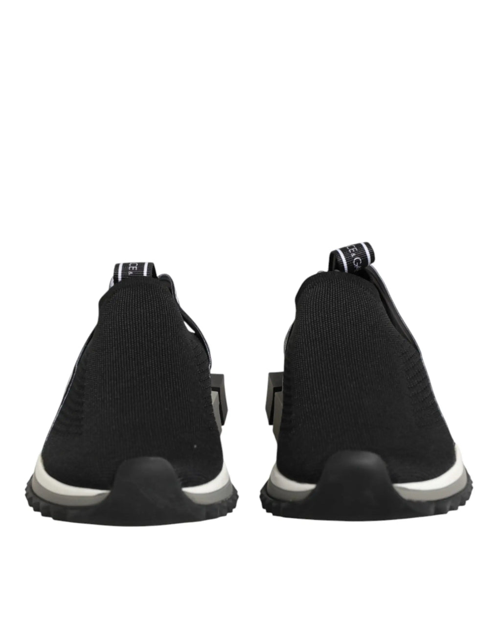 Dolce & gabbana baskets basses noires en maille slip on avec une semelle blanche et grise au design moderne