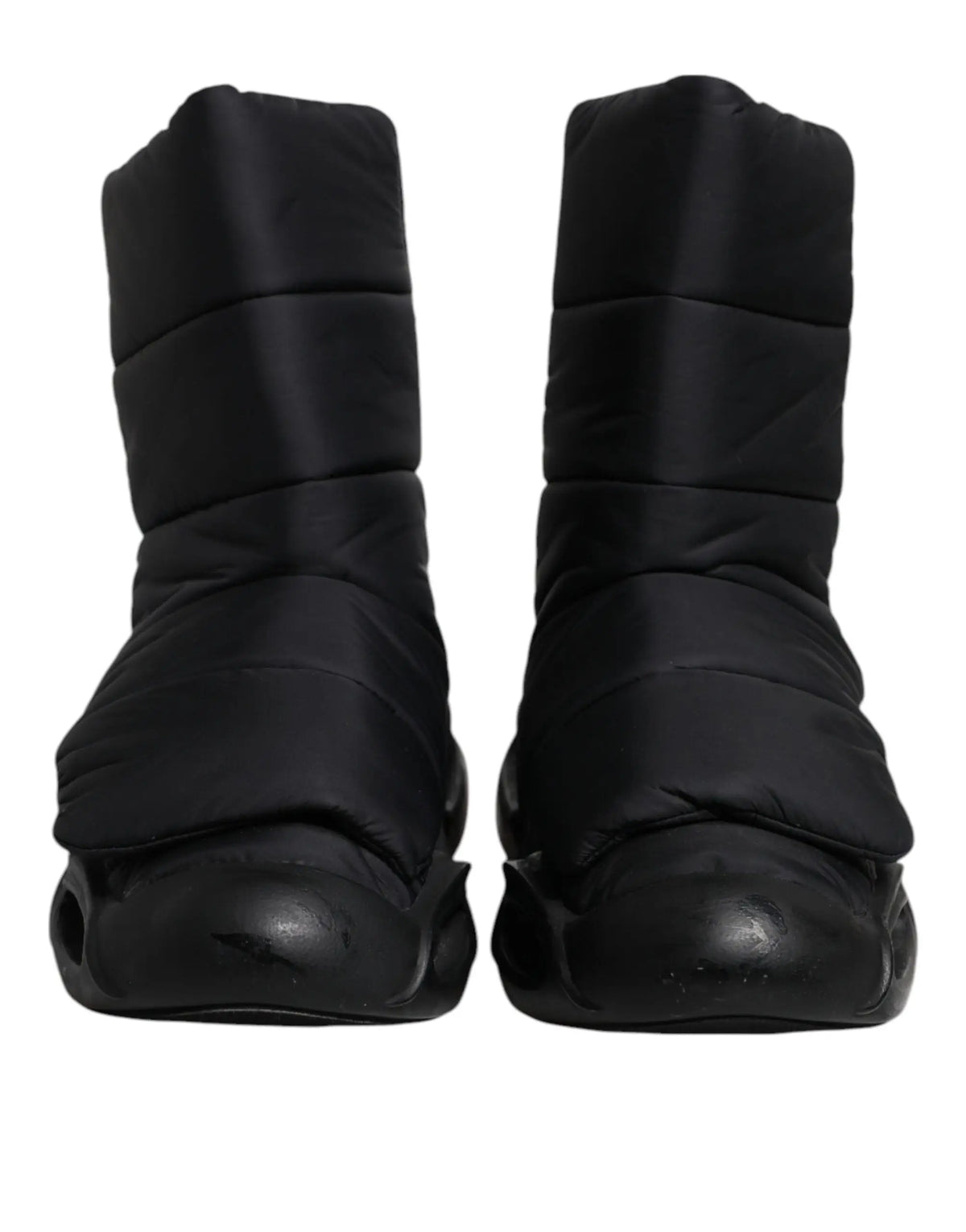 Bottes puffer noires dolce & gabbana avec design matelassé et semelles en caoutchouc brillantes