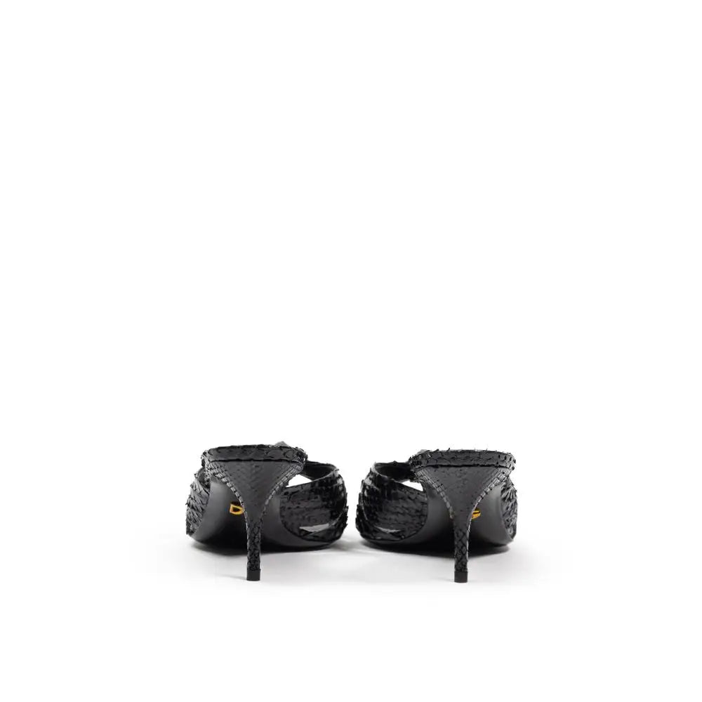 Mules à talons hauts dolce & gabbana noirs à motif peau de serpent avec un design élégant et épuré