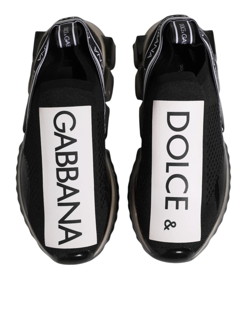Vue arrière de baskets basses dolce & gabbana sorrento en mesh noir avec logo blanc sur le talon et semelle translucide épaisse