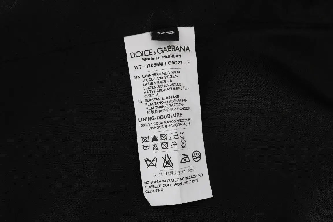 Étiquette de soin blanche dolce & gabbana sur gilet noir staff en laine vierge 97% et élasthanne 3%