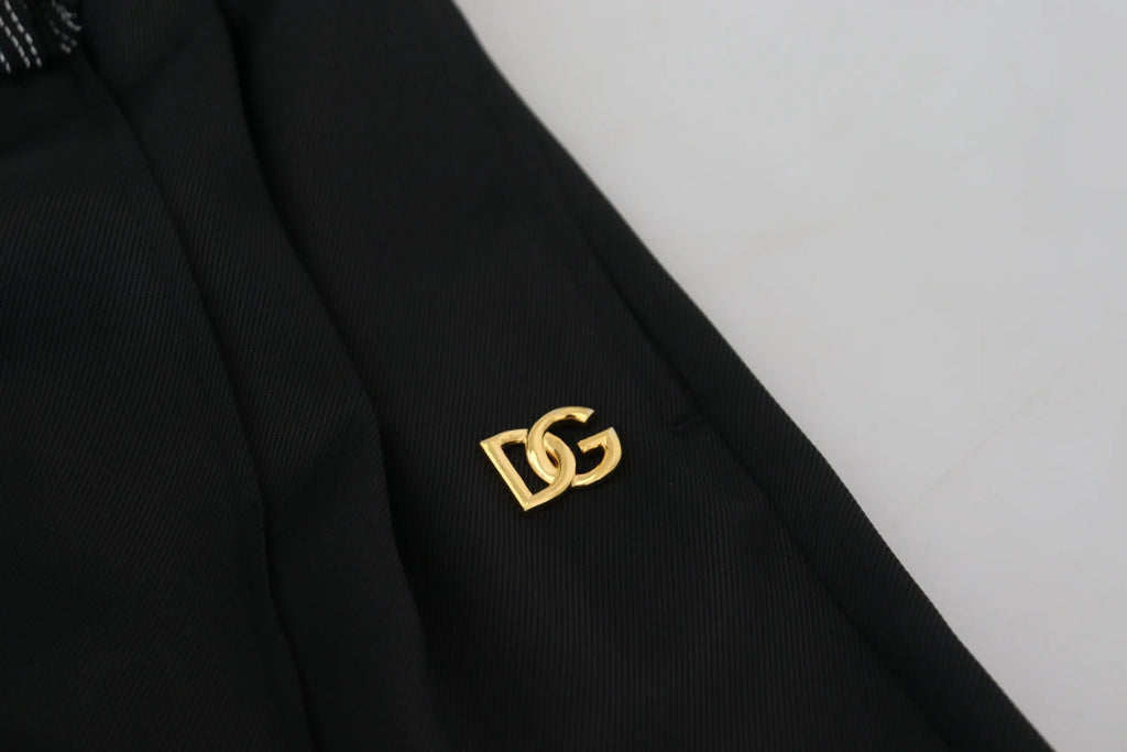 Pin logo dg doré sur tissu noir des pantalons droits en coton noir dolce & gabbana