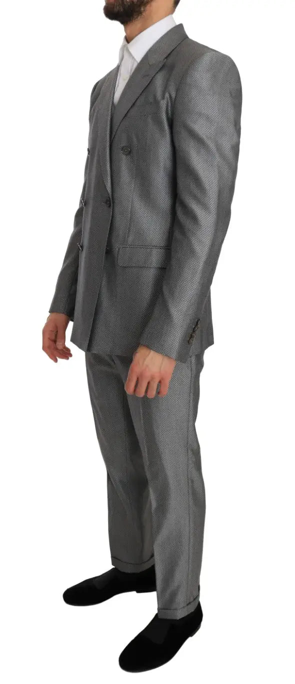 Un costume slim fit dolce gabbana noir en cristal extensible avec une veste grise à double boutonnage texturée