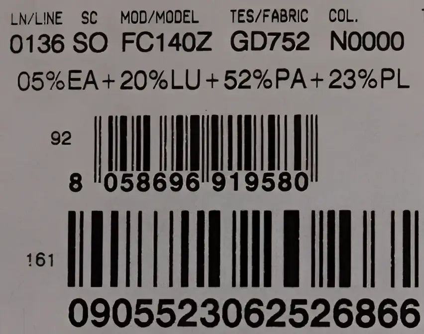 Étiquette arrière d un produit dolce & gabbana chaussettes noires stretch en tissu floral avec cristaux clairs et composition 52% pa 23% pl