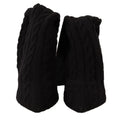 Écharpe noire en maille torsadée épaisse associée à des bottines montantes dolce & gabbana en chaussettes extensibles
