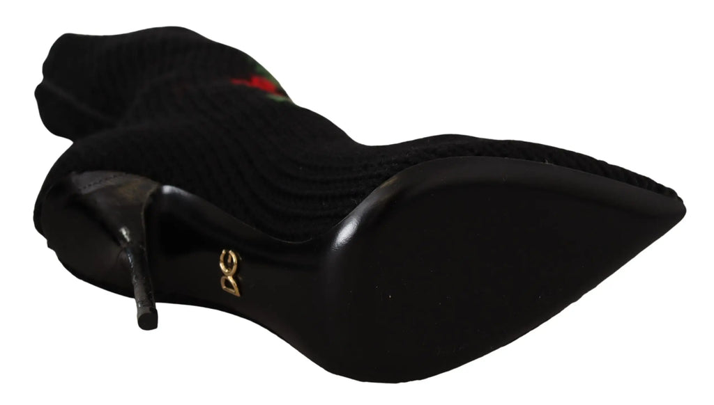 Bottine noire en suède dolce & gabbana avec talon haut fin et logo doré sur le côté roses rouges stretch