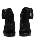 Dolce & Gabbana bottes en dentelle noire stretch avec talons plateforme et volant à la cheville