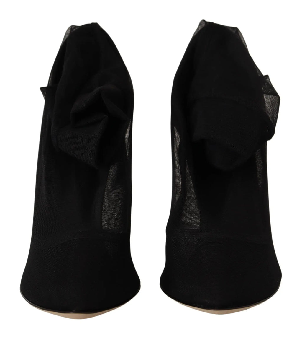 Vue arrière de bottes noires en tulle stretch avec tulle transparent et détail à volants dolce & gabbana