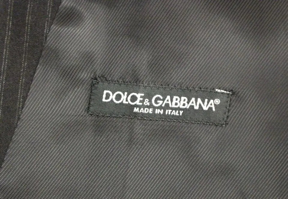 Gilet dolce & gabbana noir à rayures en laine avec étiquette noire made in italy sur tissu gris foncé à rayures
