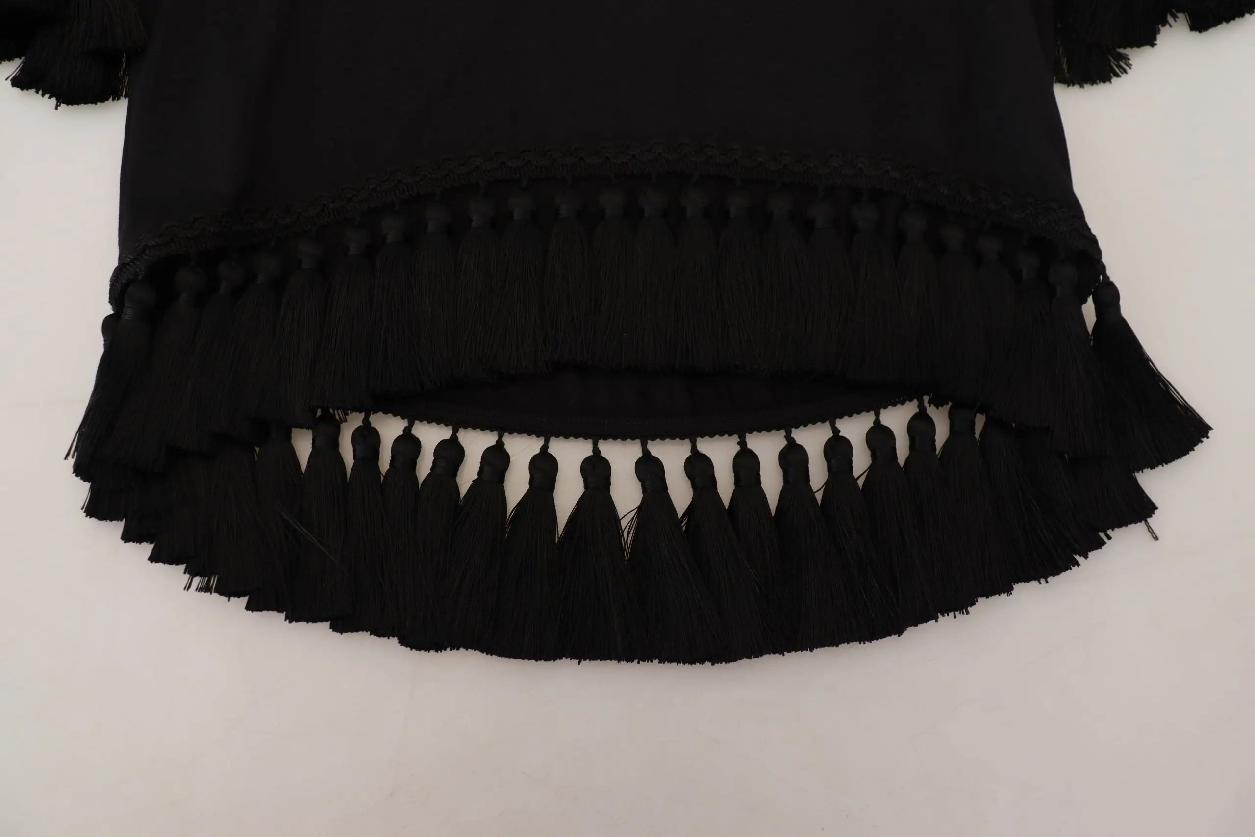 Blouse dolce and gabbana noire en coton avec volants superposés et détails à franges